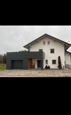 Foto - Doppelhaushälfte mit Wintergarten und PV-Anlage