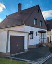 Foto - Freistehendes Einfamilienhaus mit Nebengebäude
