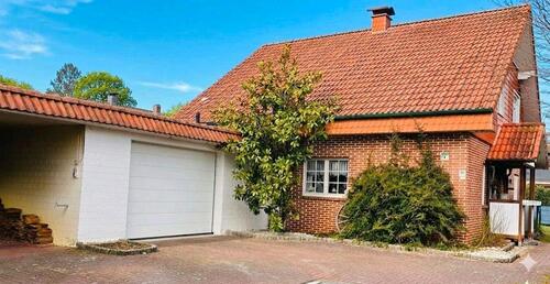 Foto - Einfamilienhaus mit Garage & Garten in Top Lage.