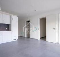 Erstbezug: Hochwertige Wohnung mit Einbauküche und Balkon - Langenbrettach