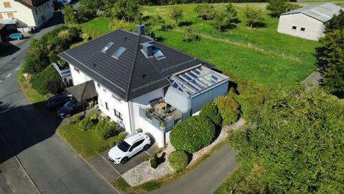 Foto - Einfamilienhaus mit großem Wintergarten in Grünberg-Stangenrod