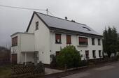 Foto - Mehrfamilienhaus mit separatem Bungalow, Garagen und PV Anlage
