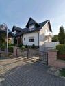 Foto - Einfamilienhaus mit Einliegerwohnung und Keller