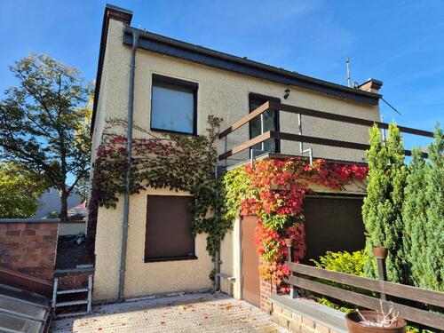 Foto - Erdgeschosswohnung im Zweifamilienhaus