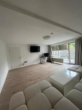 Foto - Helle 2 Zimmer Wohnung mit Terrasse und Garten