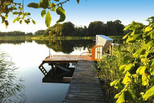 Foto - Ferienhaus am Inselsee mit Steg und Boot