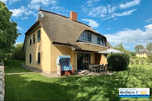 Foto - Ferienhaus Rügen Urlaub 4 Schlafzimmern, BehWhirlpSauna und Kamin