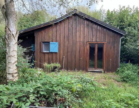 Foto - Freizeitgrundstück (700 m2 Eigentum) mit Holzhaus zu verkaufen