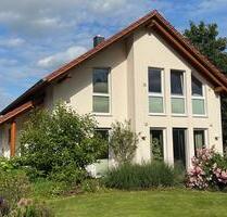Modernes Traumhaus mit wunderschönem Garten in Beedenbostel