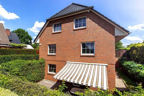 Foto - Norderstedt-Mitte möblierte 3 Zimmer Souterrain Wohnung mit großer Terrasse.