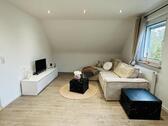 Foto - 3 Zimmer DG-Wohnung möbliert zu vermieten