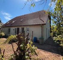 Grundstück mit Einfamilienhaus in Tessin