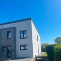 Foto - Moderne Doppelhaushälfte mit Garage und überdachter Terrasse