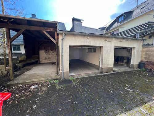 Foto - 2 Garagen + Carport + Außenstellfläche zu vermieten