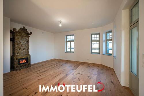 Foto - Stilvolle 4-Zimmer-Wohnung mit historischem Kachelkamin, moderner Ausstattung und sonnigem Südbalkon