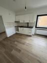 Foto - 75 m² Erdgeschosswohnung mit großer Wohnküche, Garage und Keller