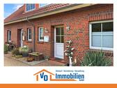 Foto - Gepflegtes Reihenmittelhaus mit Einbauküche & Terrasse in ruhiger Siedlungslage von Großefehn