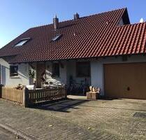 Wohnhaus mit DG-Wohnung und Garten in WertheimOrtsteil