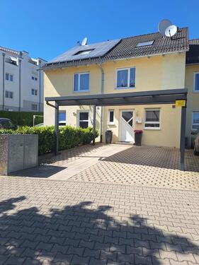 Foto - Familienfreundliches Reihenmittelhaus mit Garten und Carport