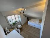 Foto - 1 Zimmer Dachgeschoßwohnung zur Miete in Kirchheim bei München