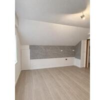 Helle Dachgeschosswohnung mit Tageslichtbad in Gütersloh