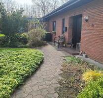 Ebenerdiger, freistehender Winkelbungalow mit Einliegerwohnung - Tarp