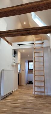 Foto - Stilvoll sanierte 1-Zimmer Dachgeschosswohnung