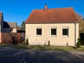 Foto - Einfamilienhaus mit Carport, Garten und Kamin