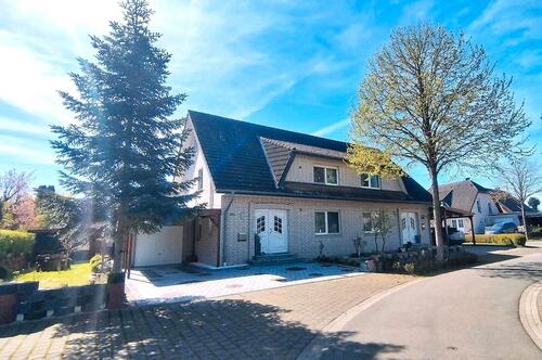 Foto - Doppelhaushälfte mit Sauna, Traumgarten & flexiblem Wohnkonzept