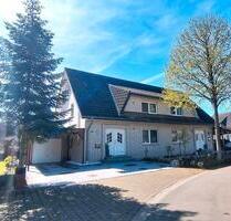 Doppelhaushälfte mit Sauna, Traumgarten & flexiblem Wohnkonzept - Preußisch Oldendorf