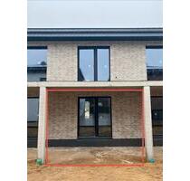 1 Zimmer Wohnung Neubau KFW 40 mit kleinem Garten - Delbrück