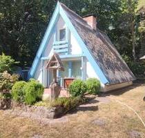Finnhütte in der Rostocker Heide – Ferienhaus in Hinrichshagen