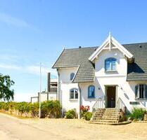 Ferienwohnung Westwind auf Fehmarn: Meerblick, Terrasse & Kamin