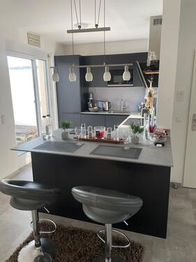 Foto - Moderne Dachgeschosswohnung mit Einbauküche