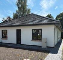 Neubau-Bungalow in Dummerstorf mit Einliegerwohnung u. Parkblick