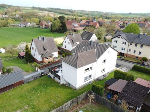 Foto - Zweifamilienhaus mit 35m² Kaminzimmer, 2 Terrassen & 800€ Miete