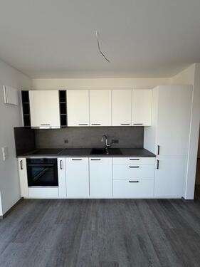 Foto - Charmante Dachgeschosswohnung in ruhiger Lage mit Einbauküche.