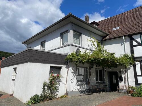 Foto - Wohn- und Geschäftshaus mit Balkon, Gartenblick