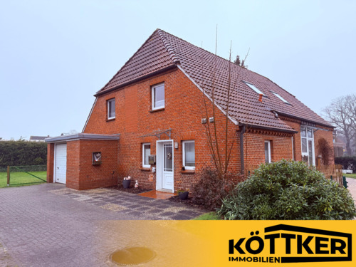 Foto - ⭐ Exklusive Erdgeschosswohnung in Völlenerfehn: Großzügiges Wohnen mit Garten & beheizter Garage ⭐