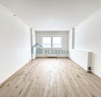 Renovierte 4-Zimmer-Wohnung mit Wannenbad, Fußbodenheizung und gemeinschaftlicher Außenanlage - Lübz