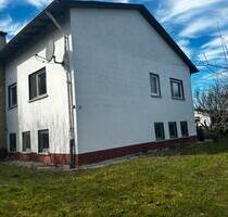 2,5 Zimmer-Souterrainwohnung auf Aussiedlerhof - Langgöns