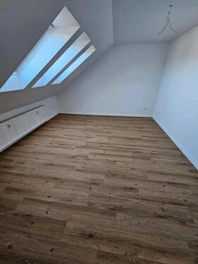 Foto - vollständig sanierte 2 Zimmer Dachgeschosswohnung