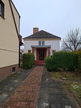 Foto - Doppelhaushälfte mit Gemeindehaus auf einem Grundstück