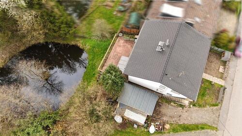 Foto - Einfamilienhaus in Much mit 1.670 m² Grundstück, Naturteich, Bach