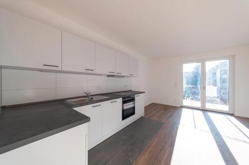 Foto - Erstbezug! - 2 Raumwohnung mit Einbauküche und Tiefgaragenstellplatz - WE14