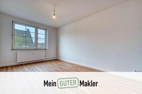 Foto - Erstbezug! Stilvoll sanierte 2-Zimmer-Wohnung mit großzügiger Wohnküche in zentraler Lage