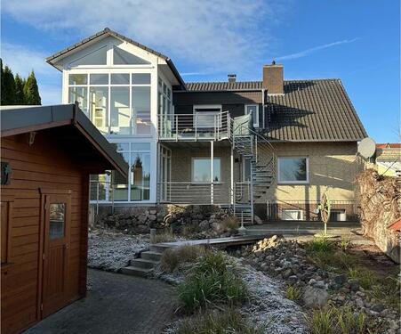 Foto - Helle Erdgeschosswohnung mit Terrasse und Wintergarten