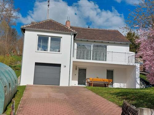 Foto - Einfamilienhaus mit Einliegerwohnung