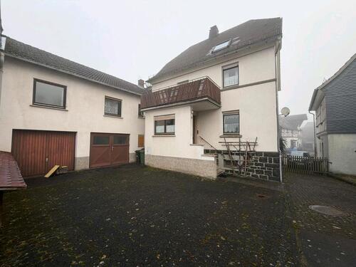 Foto - Einfamilienhaus mit Einliegerwohnung