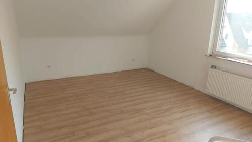Foto - Helle 2 Zimmer + Diele Dachgeschosswohnung (2.OG) 70m²